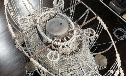 The chandelier over the stage comprises 40,000 hanging beads.