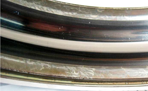 Outer ring raceway of a deep groove ball bearing showing a frosted running track